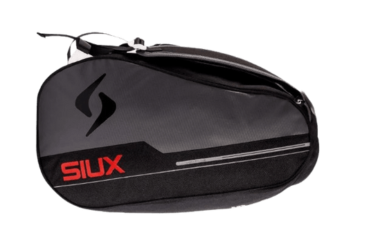 Red SIUX Pulse padel racket bag showing multiple compartments and padded straps for comfortable carrying.